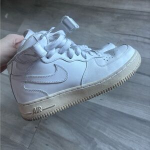 Women’s White Nike High-Top Sneakers